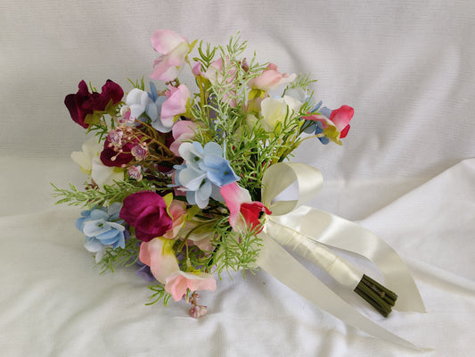 Sweet pea, Hydrangea, Gypsophila, and Rosemary Foliage wedding flowers 