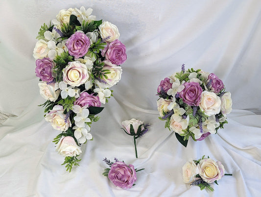 Pastel pink and purple rose wedding flowers