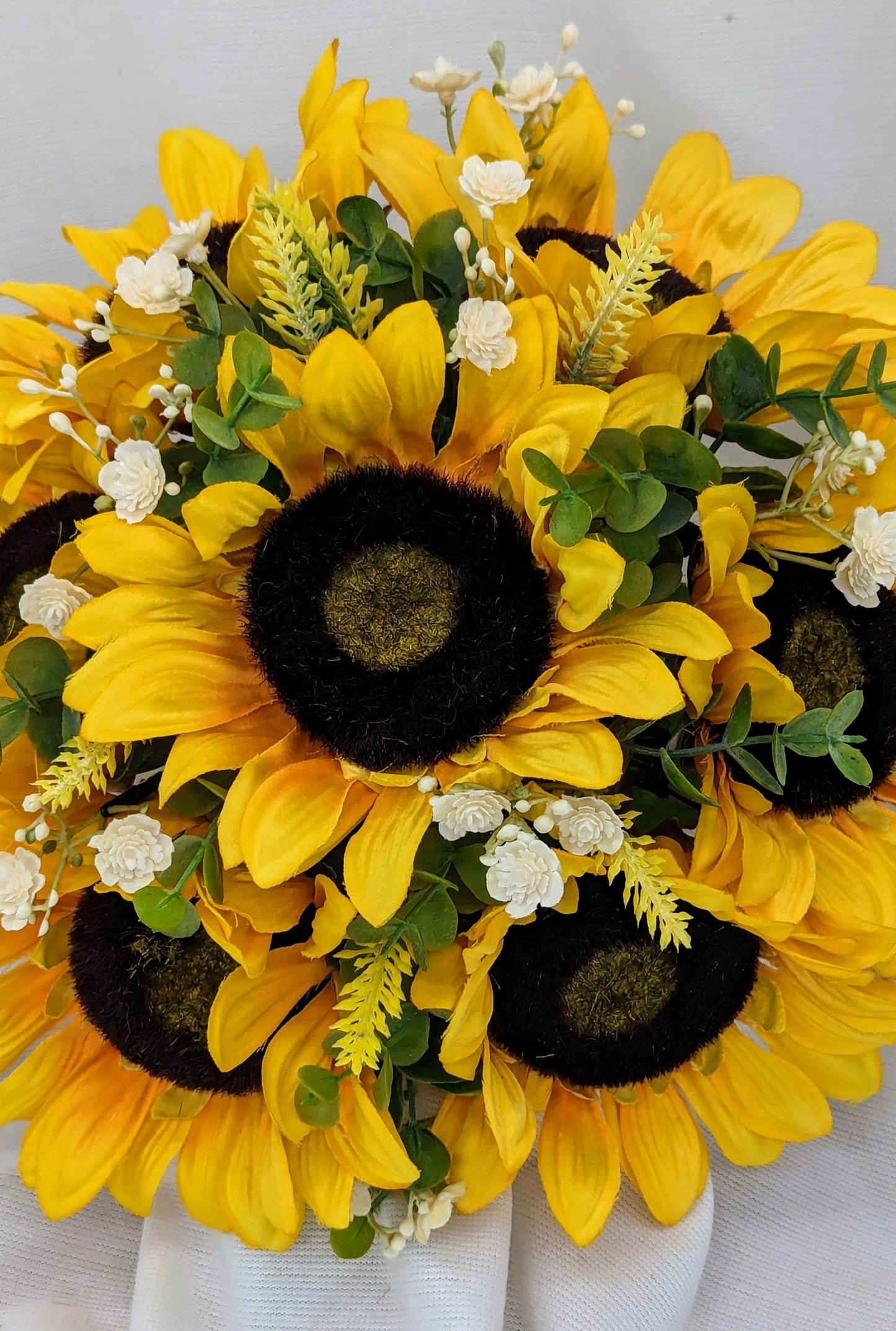 Sunflower, heather,gyp and eucalyptus wedding flowers