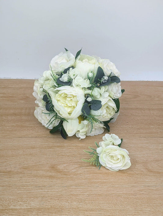 Ivory rose, peony hydrangea and foliage wedding flowers 