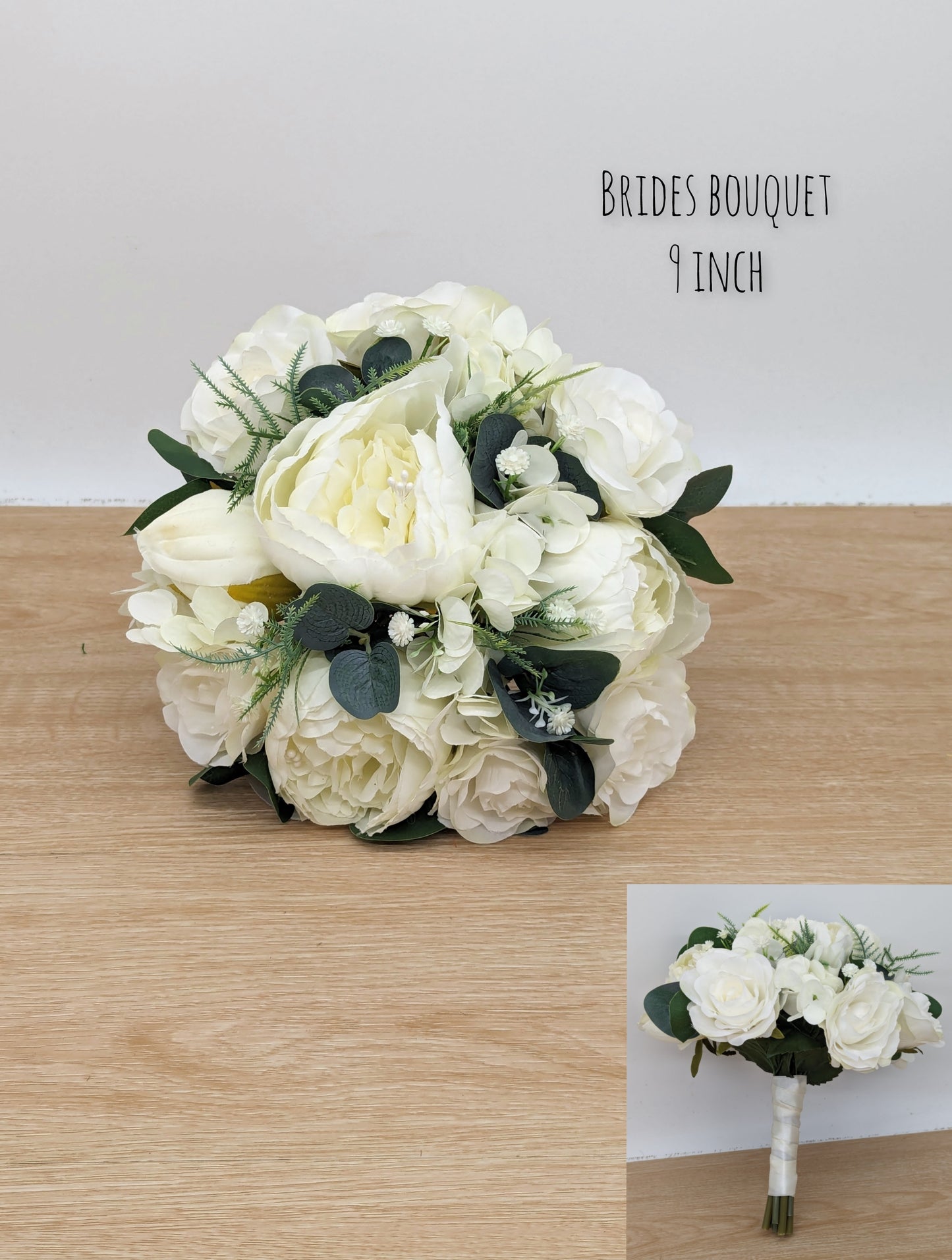 Ivory rose, peony hydrangea and foliage brides bouquet 