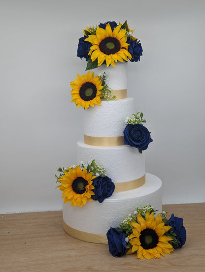 Sunflower, blue rose and foliage cake flowers and topper.